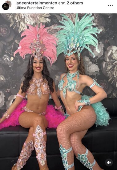 Miss Glamurosa customers wearing samba costumes in pink and blue mint colors